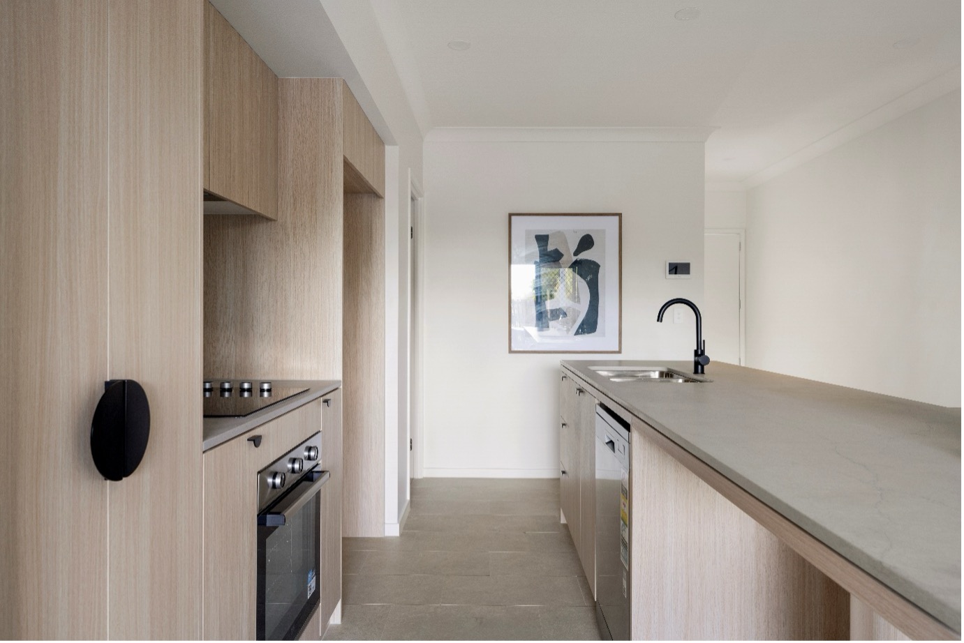 Nero Dolce gooseneck kitchen mixer in matte black &mdash; solid brass construction with a high-arching spout, 35mm ceramic disc cartridge and NEOPERL aerator for smooth, water-efficient flow. Featured in the Munro by Azure kitchens.